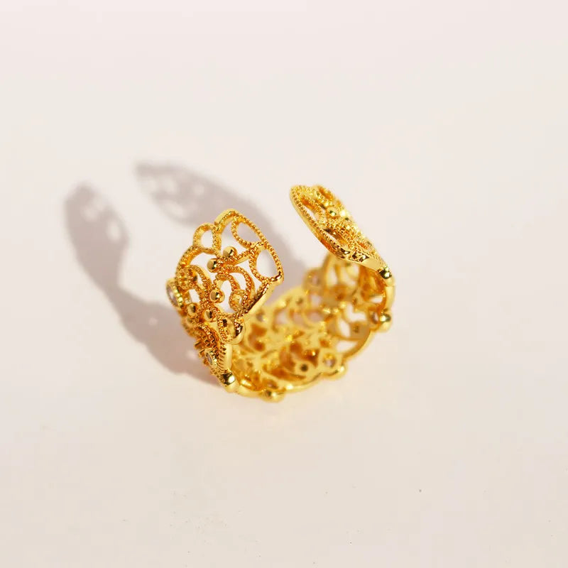 Zircons Intricate Gold Ring
