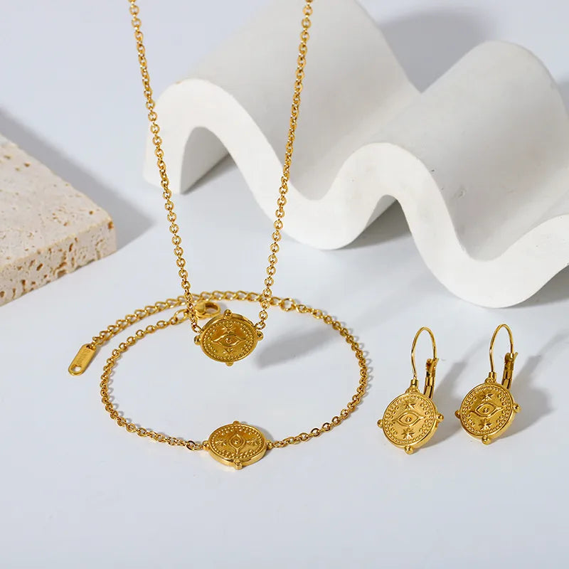 Gold Eye Hoop Earrings