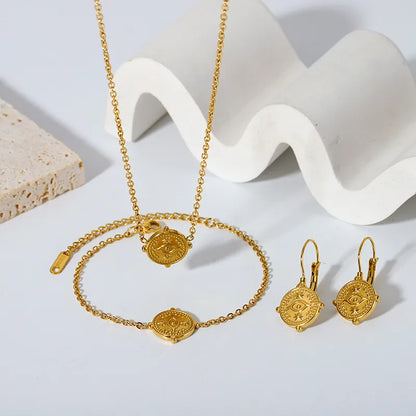 Gold Eye Hoop Earrings