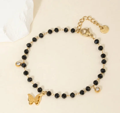 Gold Charms Black beaded Bracelet